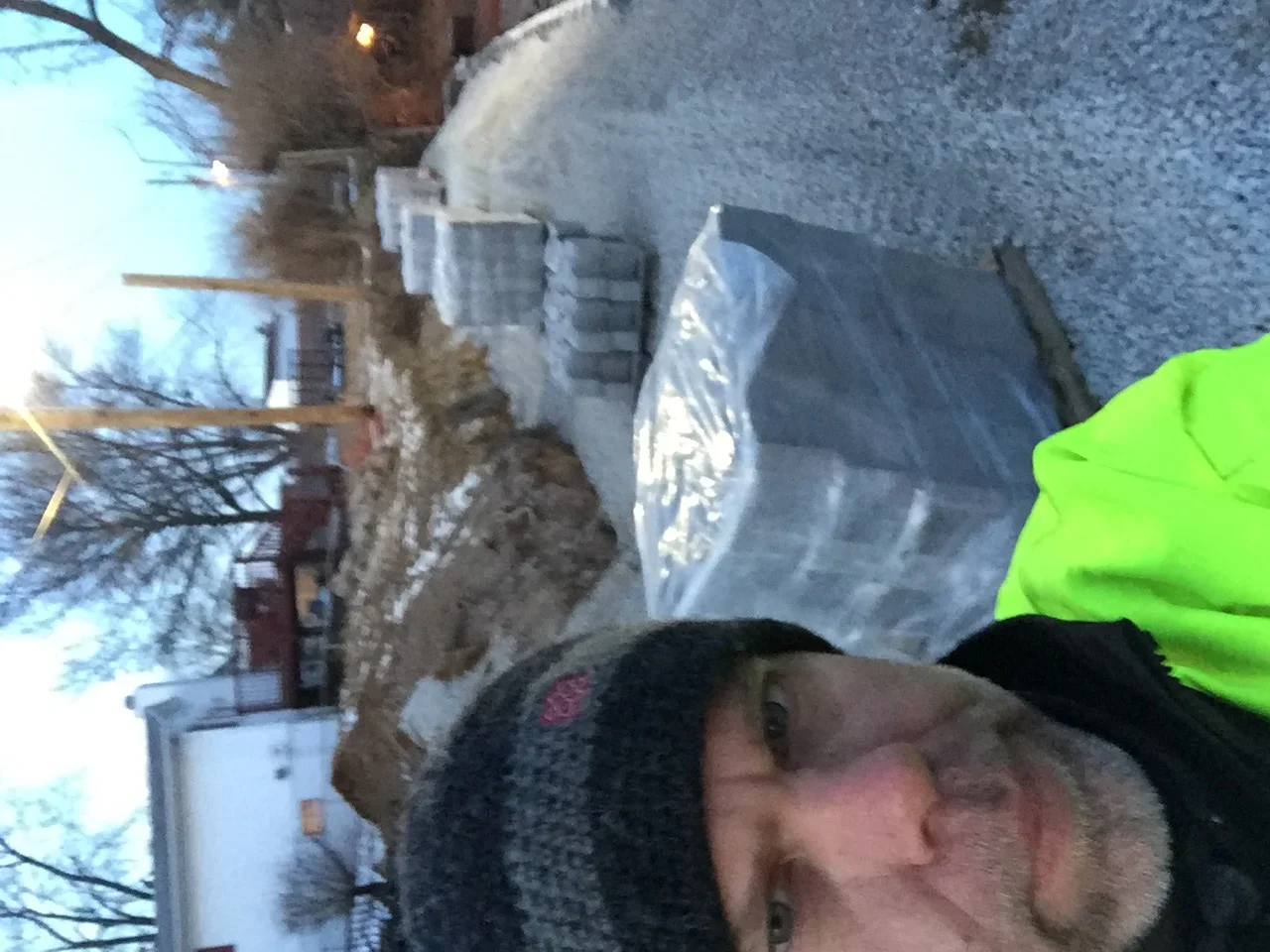Demolition debris bagged and staged for removal from residential site